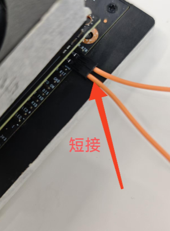 Shorting the two pins with a Dupont wire